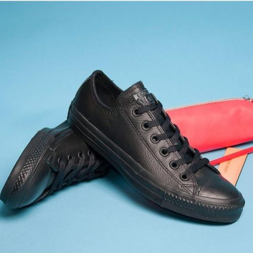 All black converse with a rubber sole.